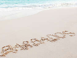 Barbados lettering on a sandy beach