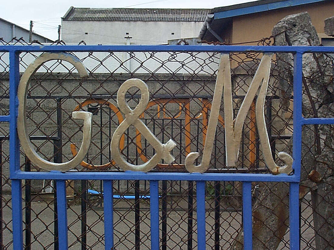 Logo of the G&amp;M Iron Gate